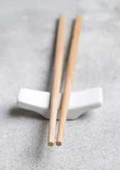 Wall Mural - Chopsticks on a light background