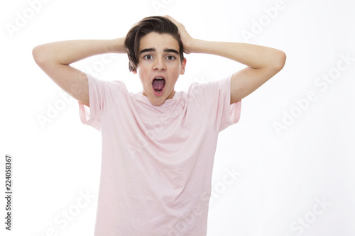 Fotografija young isolated with expression of surprise