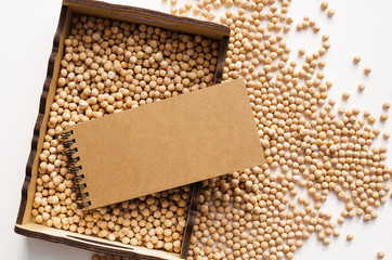 dry raw chickpeas in wooden box