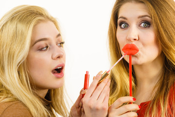 Wall Mural - Two women and lip product