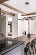 Nice interior in modern style with wooden beams