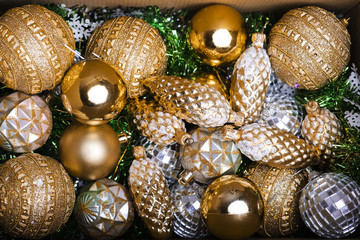 Christmas decorations placed in box