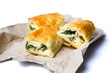 Homemade pie with cheese and spinach isolated