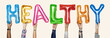 © Rawpixel.com - Hands showing healthy balloons word