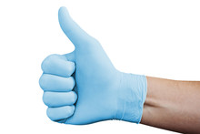 Hand In Blue Medical Glove Showing Approval Thumbs Up Sign Isolated On White Background