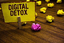 Writing Note Showing Digital Detox. Business Photo Showcasing Free Of Electronic Devices Disconnect To Reconnect Unplugged Clothespin Holding Yellow Paper Note Crumpled Papers Several Tries