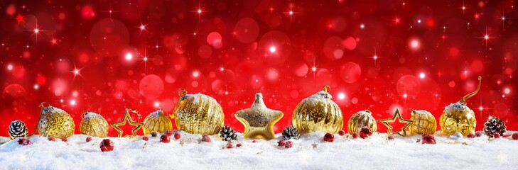 Wall Mural - red christmas banner - golden balls and baubles on snow