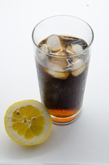 cold soda with ice and lemon