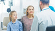 © Gorodenkoff - Mother with Sweet Little Girl Visit Friendly Pediatrician. Doctor Talks to Them after Thorough Examination. Brightand Modern Medical Office.