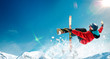 © Artur Didyk - Skiing. Jumping skier. Extreme winter sports.