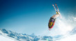 © Artur Didyk - Skiing. Jumping skier. Extreme winter sports.