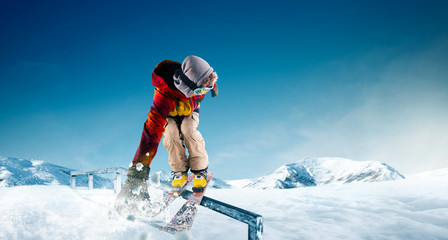 Wall Mural - Skiing. Jumping skier. Extreme winter sports.