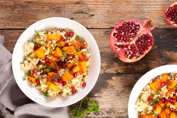 vegetarian meal with quinoa, pumpkin and pomegranate