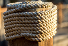 Detail Of Wrapped Rope Tied On Wooden Pole