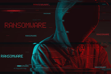 Wall Mural - Ransomware concept with faceless hooded male person