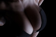 © PixlMakr - Woman with huge breasts in black sheer negligee from above