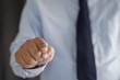 © onephoto - Business man hold the smartphone on the street  and copy space.