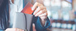 Business women hand Using a credit card, she pulled the card out of her wallet.Web banner.