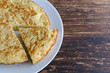  Tortilla, Spanish omelette made with eggs and popatoes.Popular tapas or snack in Spain.Copy space.