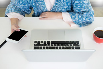 Wall Mural - Attractive Young beautiful entrepreneur Woman smiling and looking at laptop screen, Working from Home