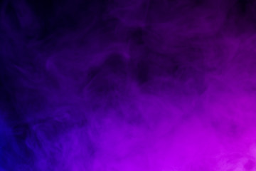 Colorful smoke close-up on a black background