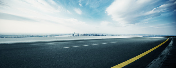 Poster - empty highway through modern city