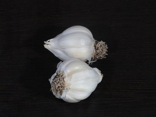 Isolated garlic. Two raw garlic with segment isolated on white background, with clipping path,Fresh garlic isolated on white background, Garlic on Wooden Background,