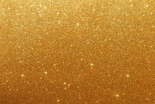 Gold Glitter Vintage Lights Background. De-focused.