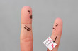 Fingers art of people. Concept of boy got a bad grade, man scolding child.