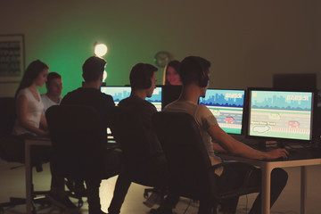 Poster - Young people playing video games at tournament