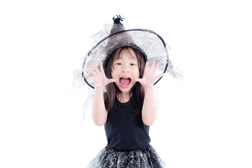 Little asian girl wearing witch costume for Halloween isolated over white background