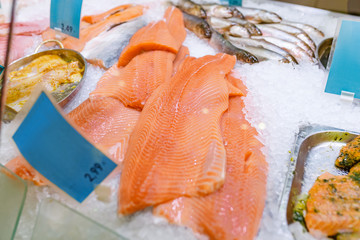 Wall Mural - Salmon Fillet in Ice on the supermarket counter, healthy fresh sea food