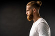 © opolja - Side view portrait of thinking stylish young man looking away.