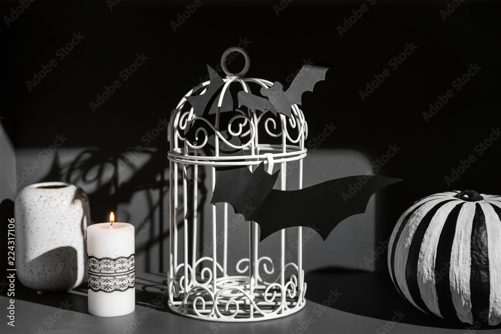 Creative decorations for Halloween party on dark table