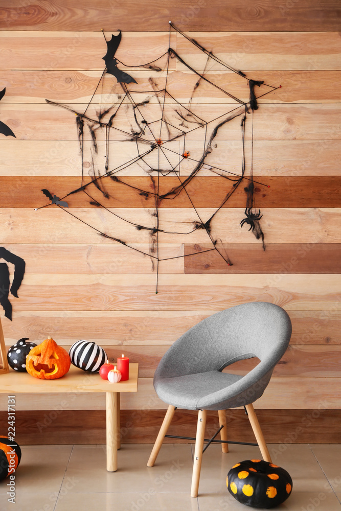 Creative decorations for Halloween party near wooden wall