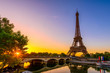 View of Eiffel Tower and river Seine at sunrise in Paris, France. Eiffel Tower is one of the most iconic landmarks of Paris