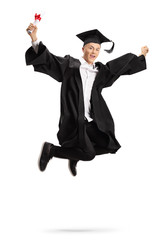 Overjoyed graduate student with a diploma jumping