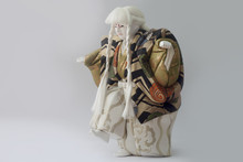 Clay Doll Of Japan Of Hakata-ningyoo In Black And Gold Color Uniform.