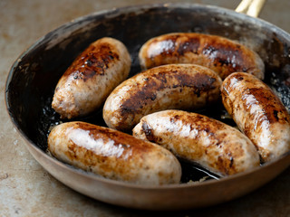 Wall Mural - rustic pan roasted sausages