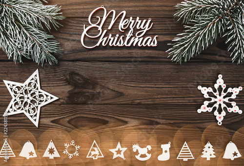 Fotografie, Obraz View from above of a Merry Christmas inscription and handmade tree toys, stars a