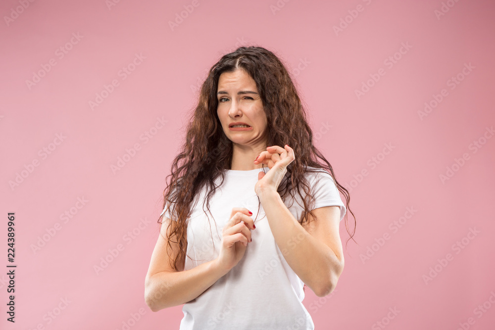 Ew. It's so gross. Young woman with disgusted expression repulsing something. Disgust concept. Young emotional woman. Human emotions, facial expression concept. Studio. Isolated on trendy pink color - obrazy, fototapety, plakaty 