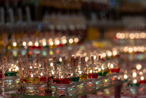 Photo Candles Lit during a ceremony inside the Tooth Relic temple in Singapore