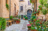 Fototapeta Uliczki - Scenic sight in Spello, flowery and picturesque village in Umbria, province of Perugia, Italy.