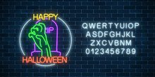 Glowing Neon Sign Of Halloween Banner Design With Bony Hand From Grave And Alphabet. Halloween Night Scary Sign