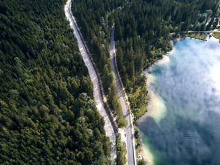 Sticker - Aerial view of the road near the lake and the forest from above