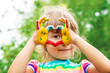 © yanadjan - children hands in colors. Summer photo. Selective focus.