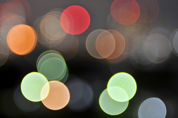 Colorful defocused bokeh lights in blur night background