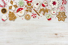 Christmas Gingerbread And Sweets On Wooden Background With Copy Space