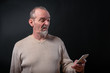 © Armin Staudt - old man don't understand his smart phone