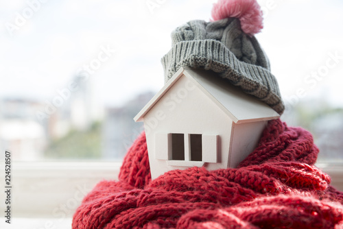 Cuadros en Lienzo house in winter - heating system concept and cold snowy weather with model of a